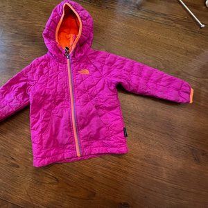 Girl's pink North Face hooded winter jacket